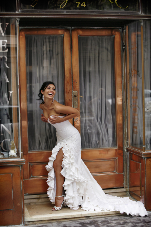 White sheath dress with Flamenco style ruffles - wedding photo by Jerry Ghionis